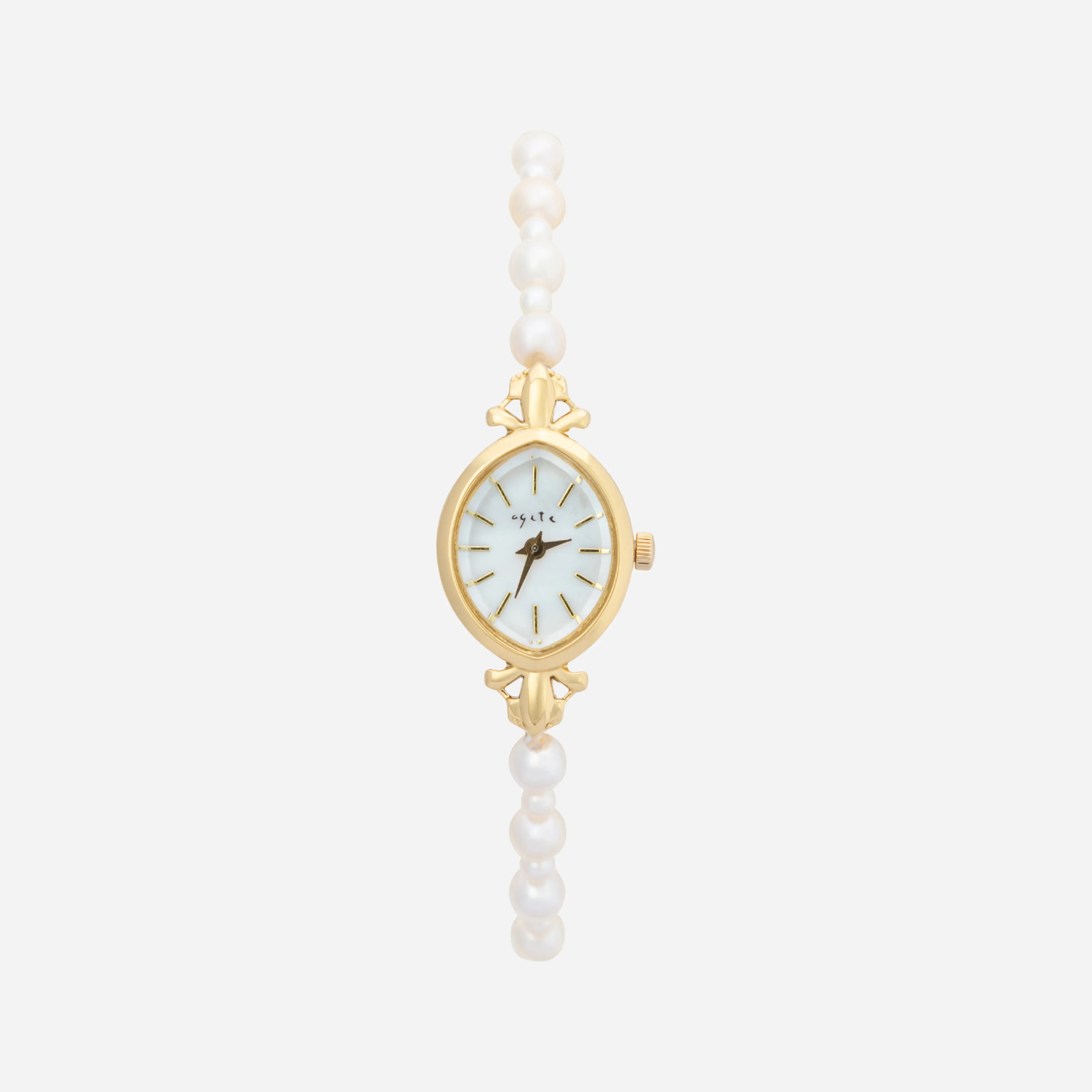 Aurelia – Gold ladies' watch with a drop-shaped case.