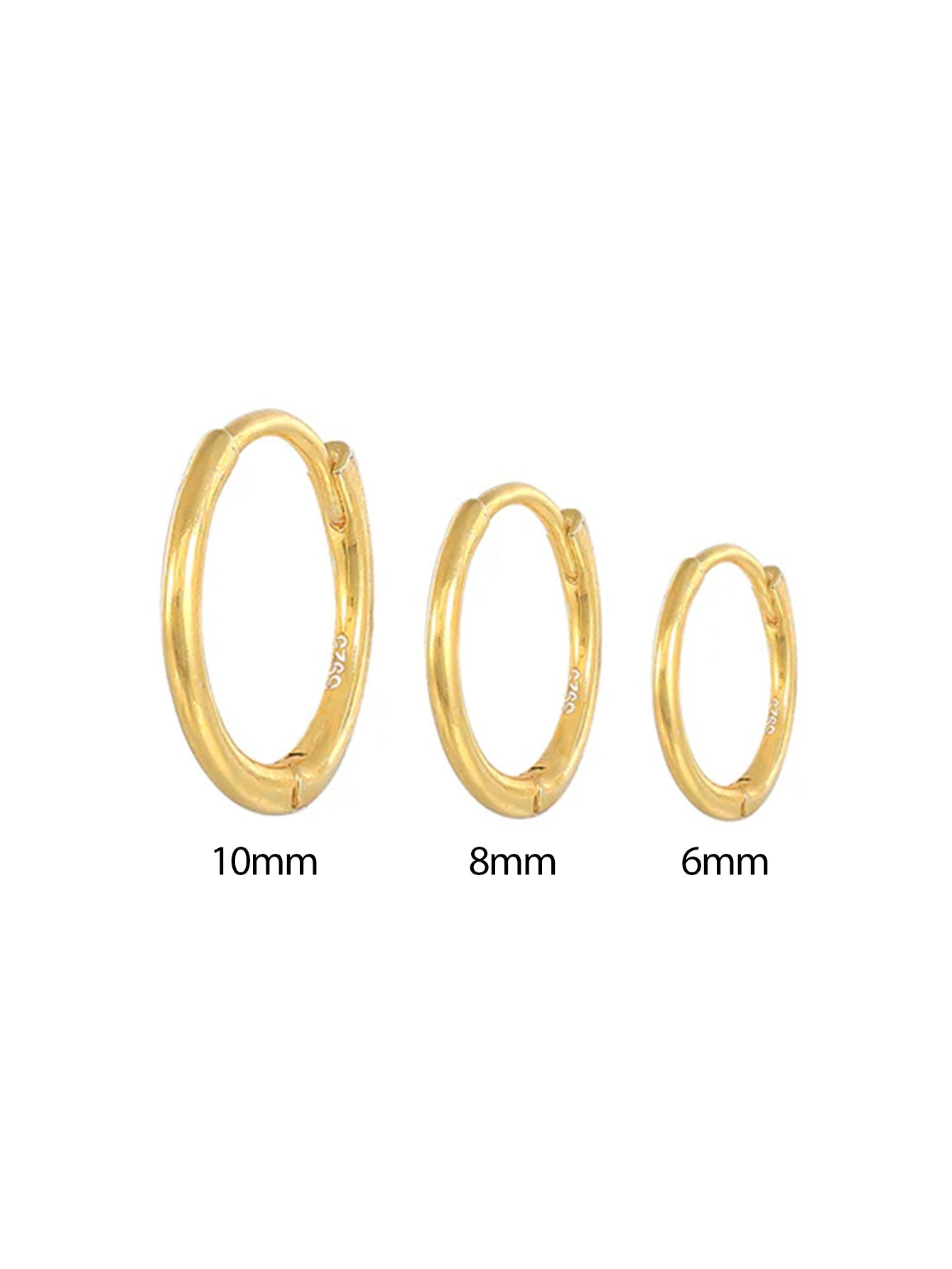 Emilia – Earrings of thin gold with a soft sheen.