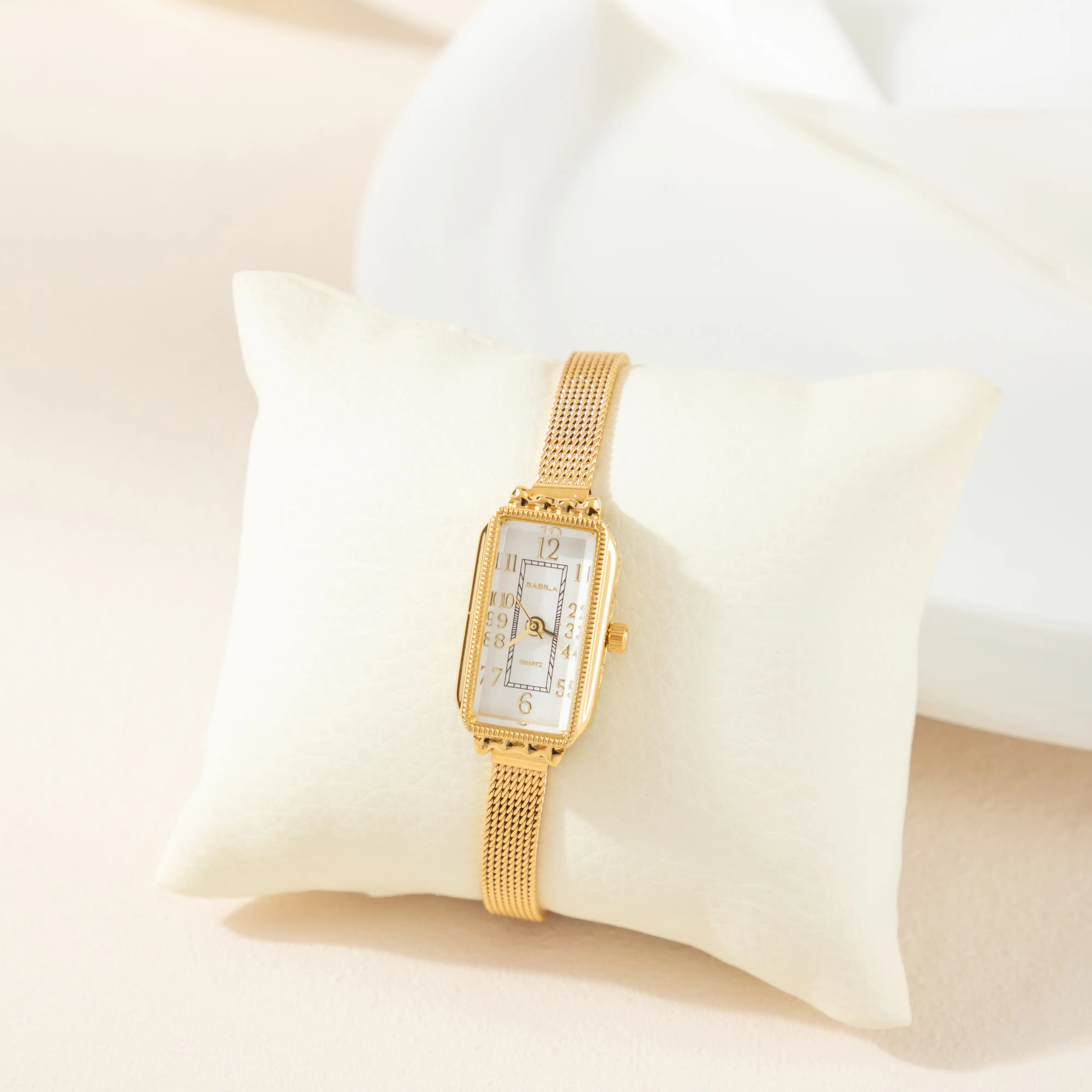 Teoresa – Gold Watch with Rectangular Dial.