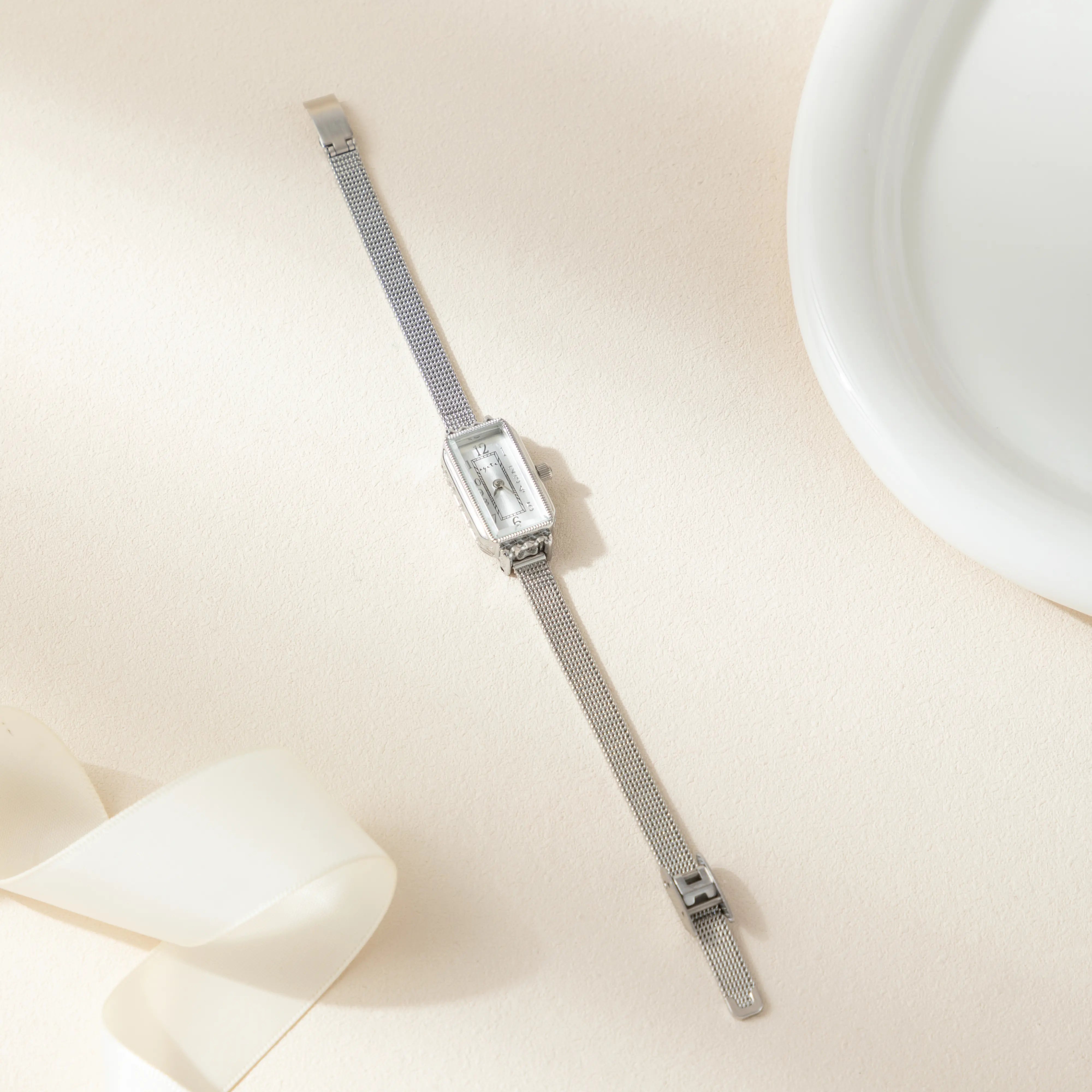 Teoresa – Gold Watch with Rectangular Dial.