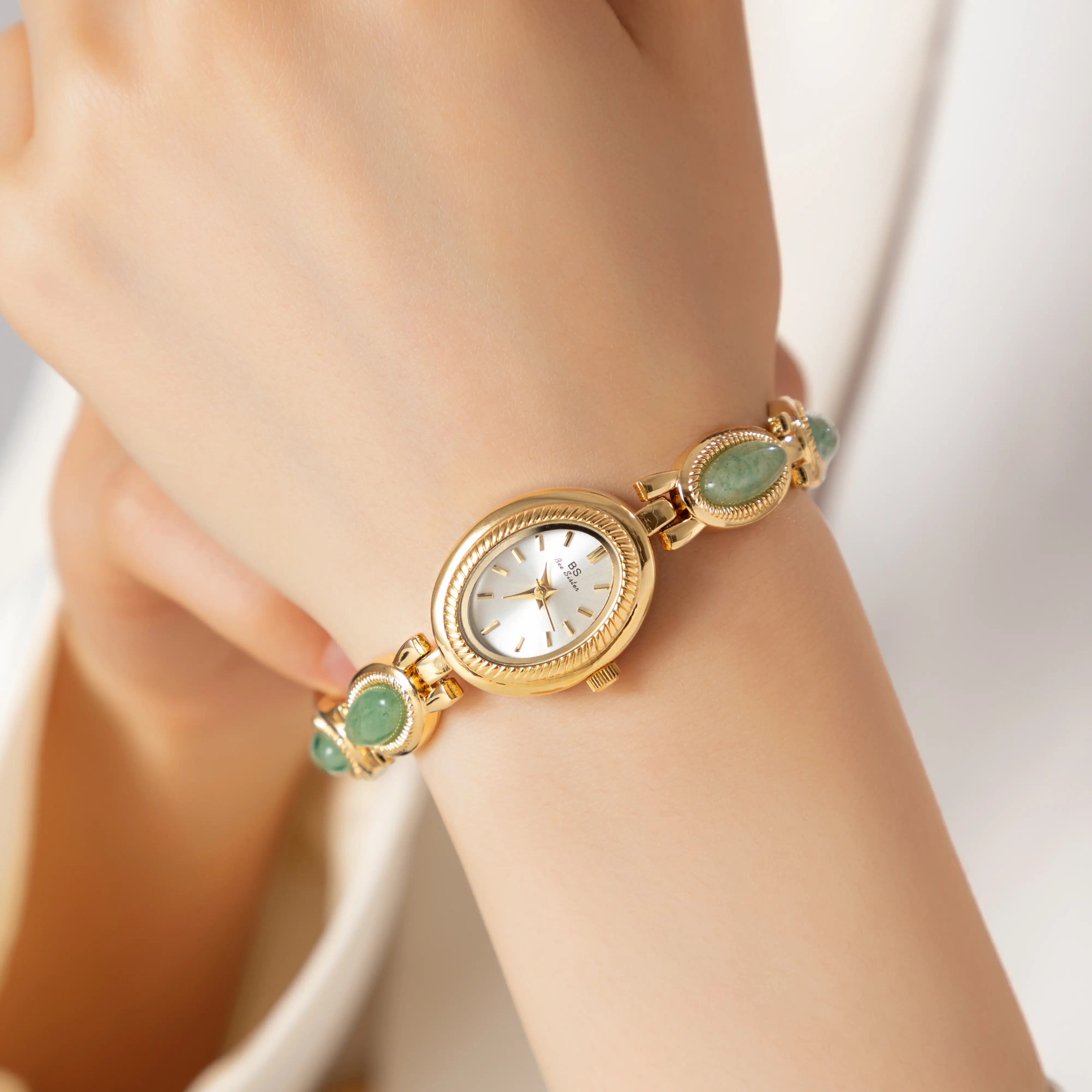 Clara – Gold Bracelet with Extended Watch.