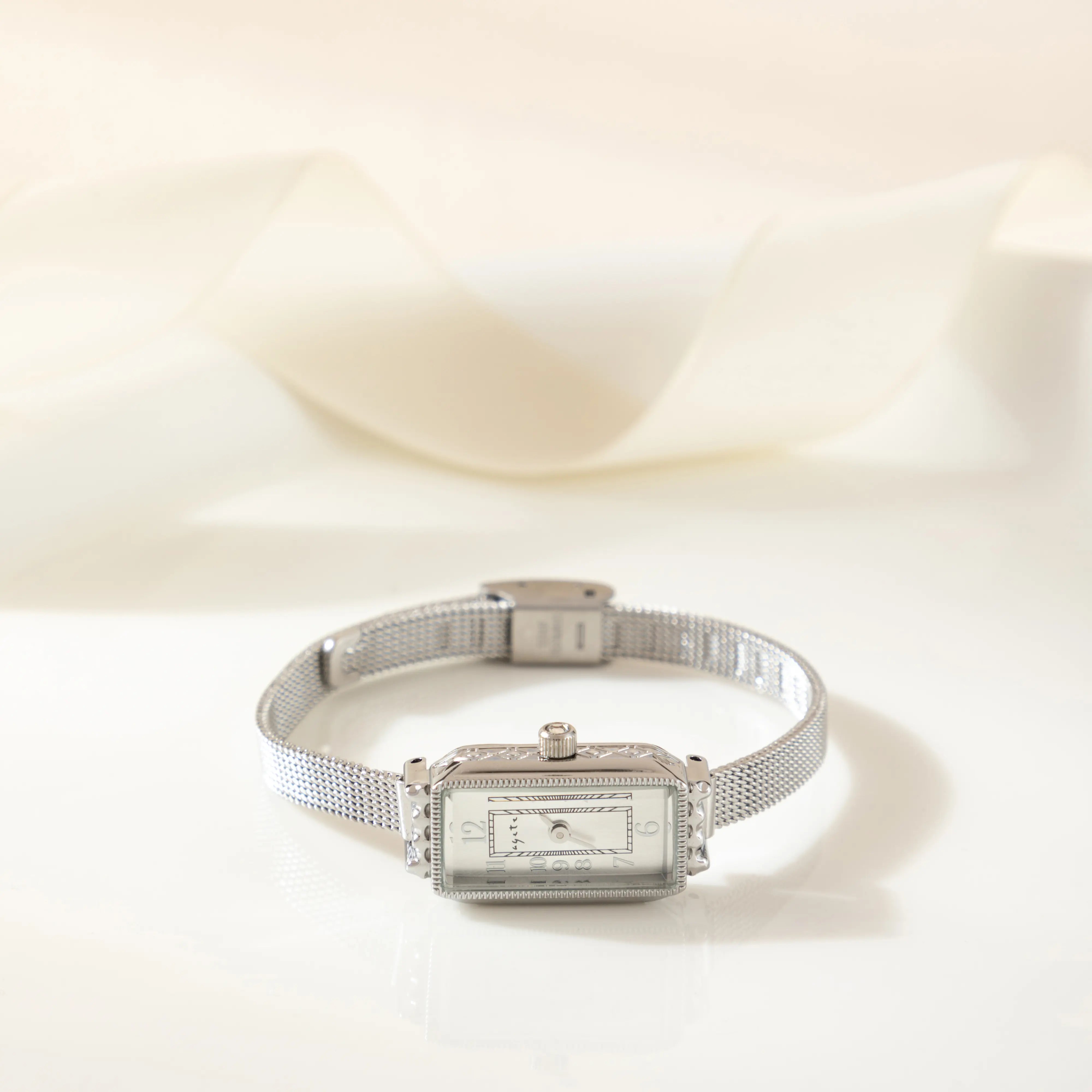 Teoresa – Gold Watch with Rectangular Dial.