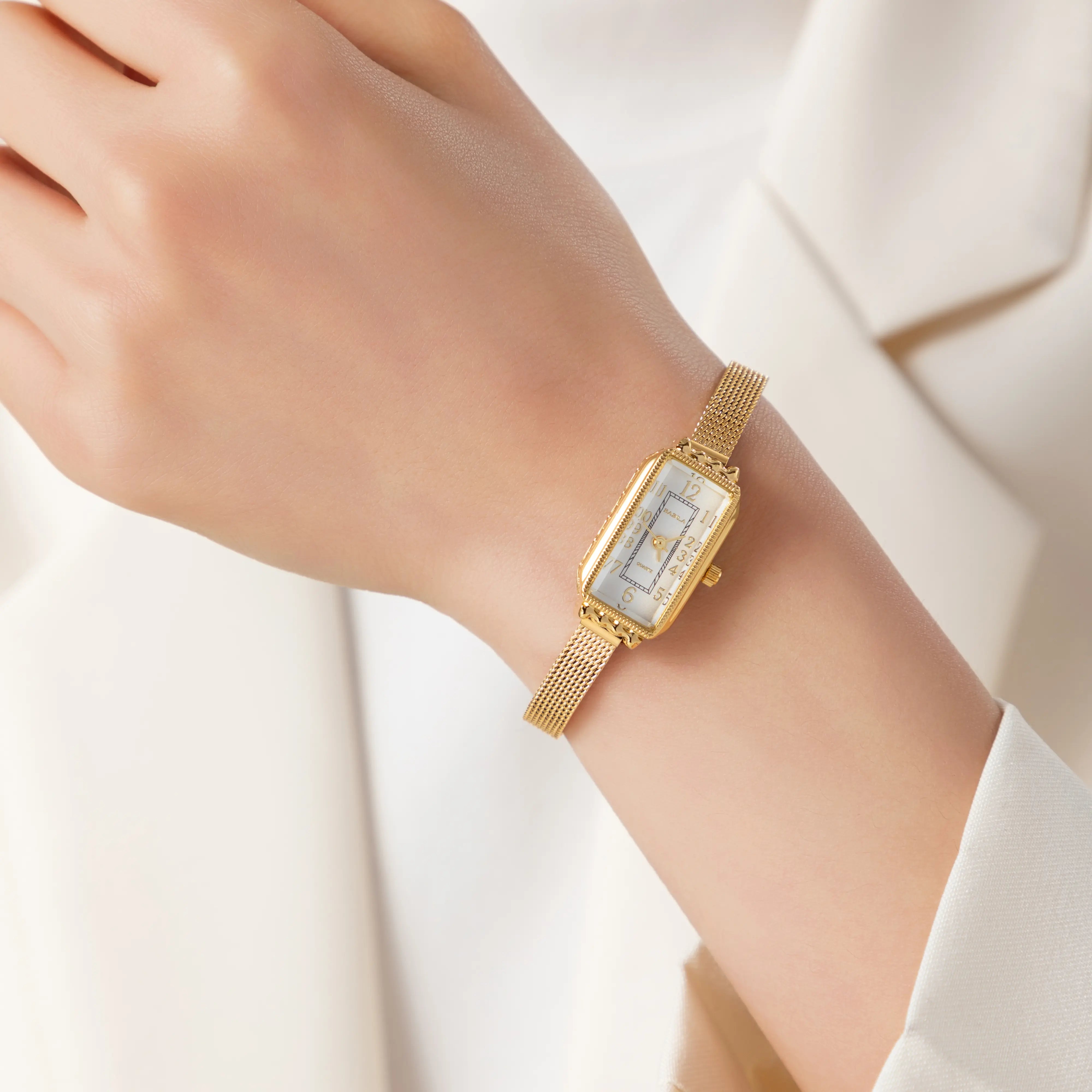 Teoresa – Gold Watch with Rectangular Dial.