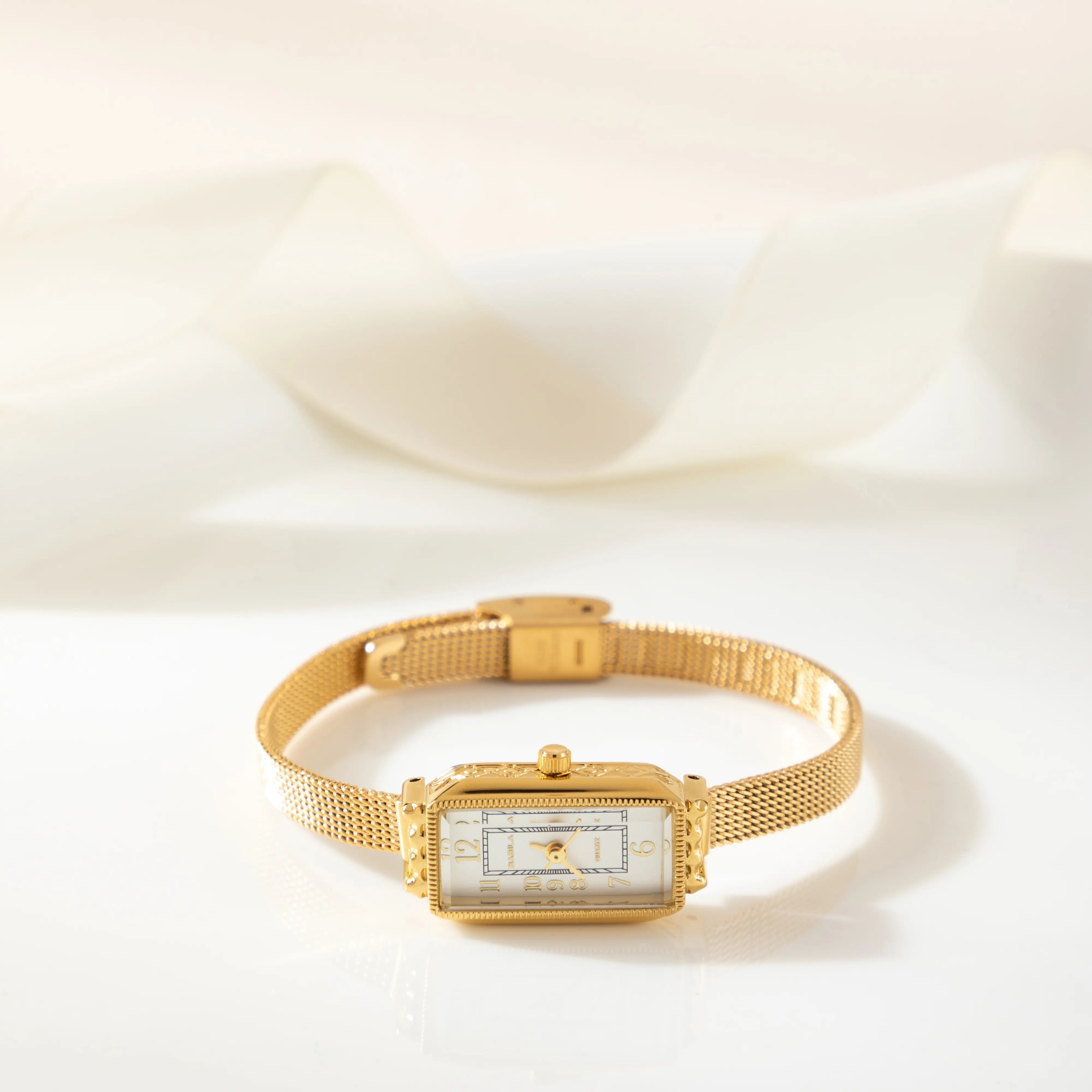 Teoresa – Gold Watch with Rectangular Dial.