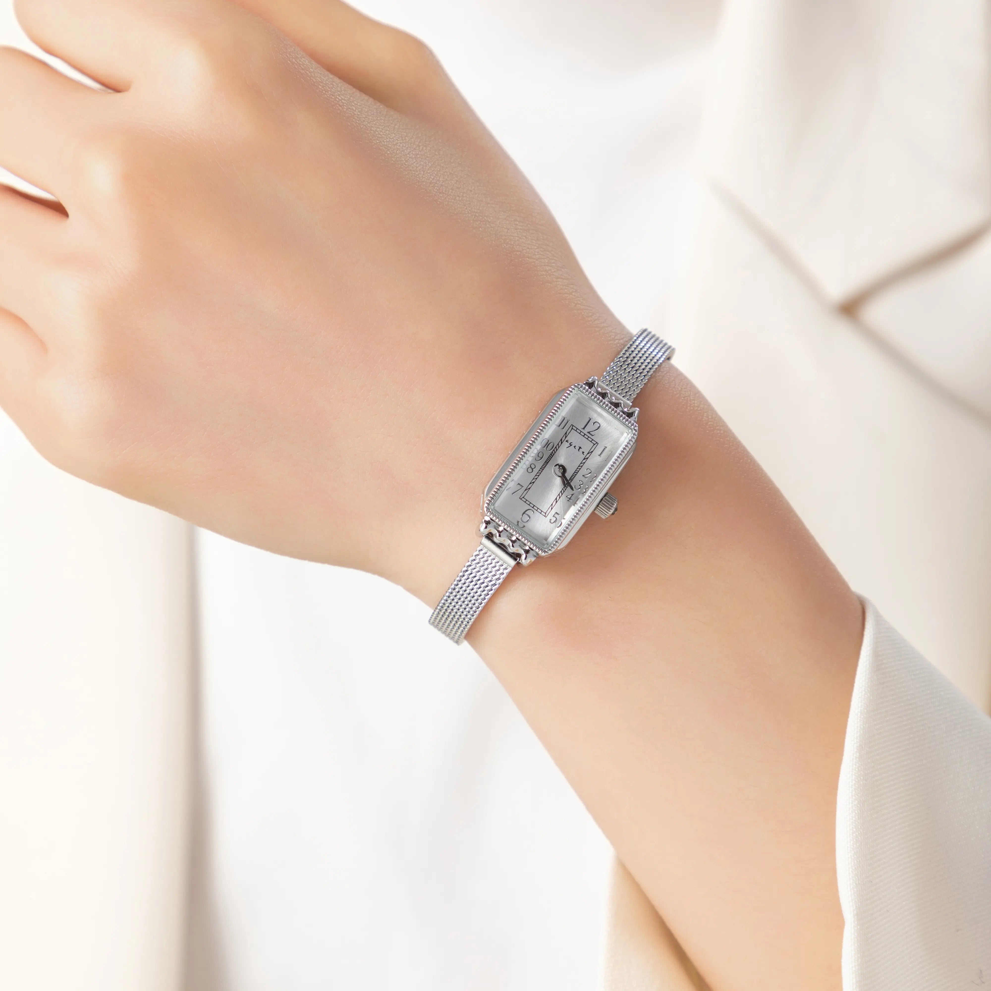 Teoresa – Gold Watch with Rectangular Dial.