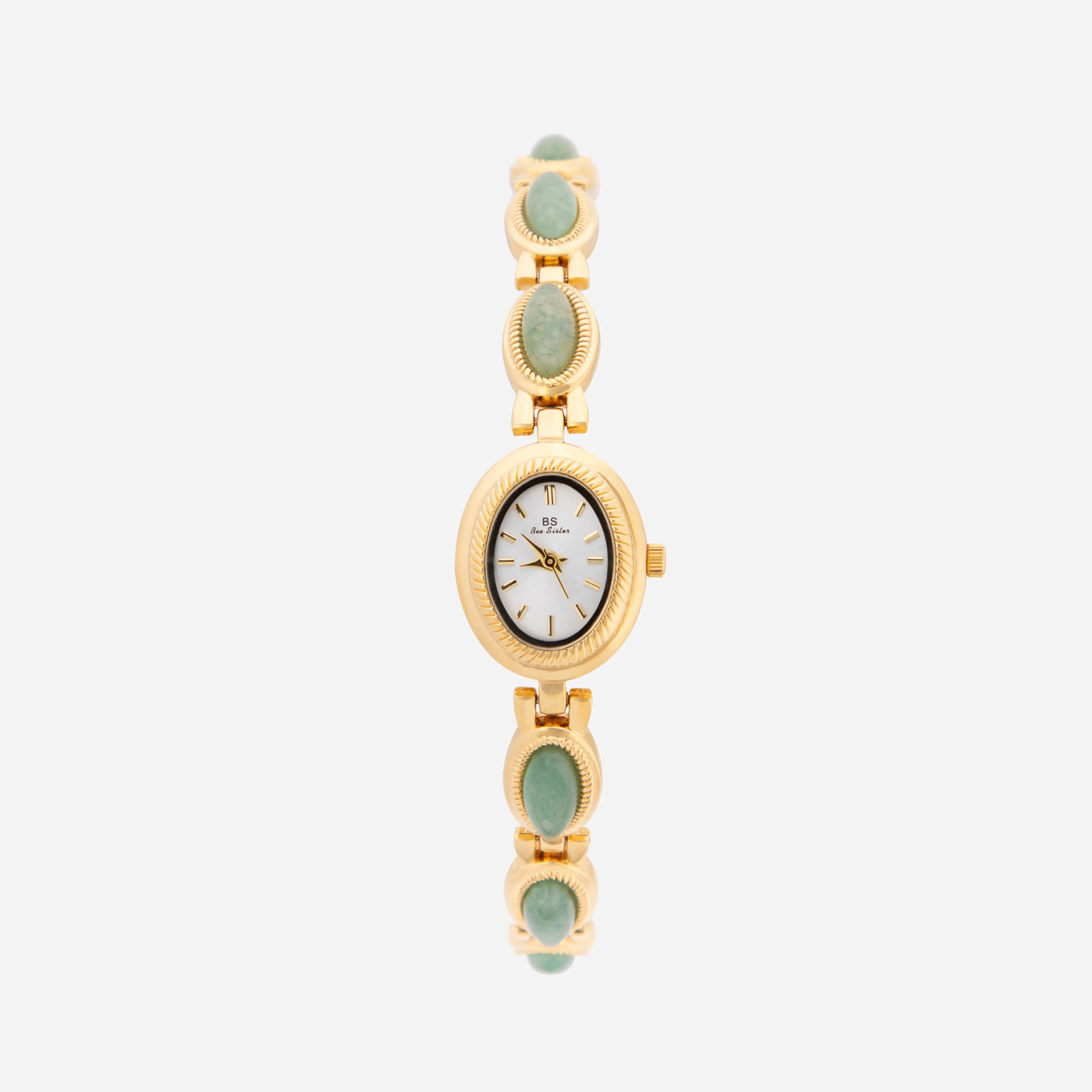 Clara – Gold Bracelet with Extended Watch.