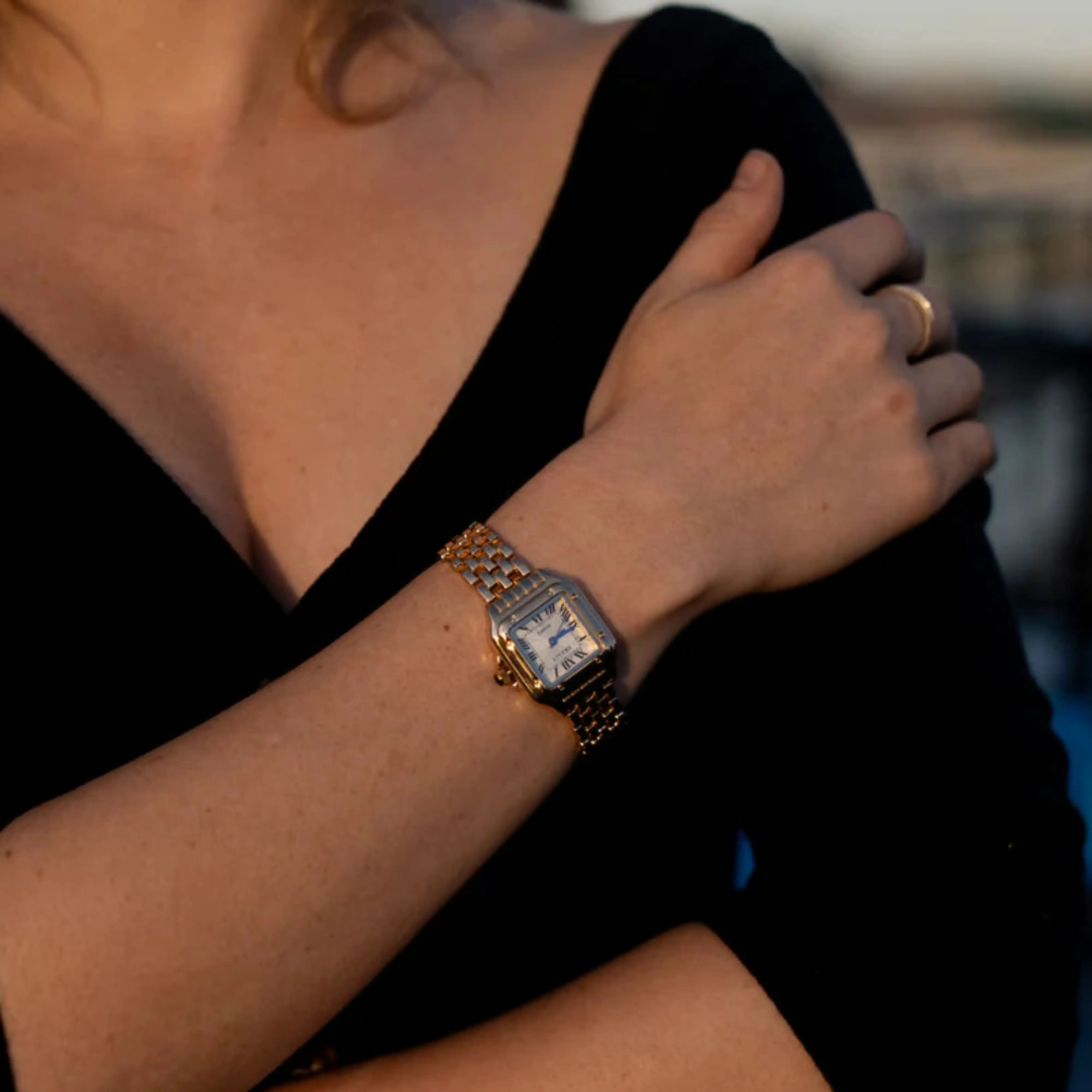Leonie – Gold watch with square case.