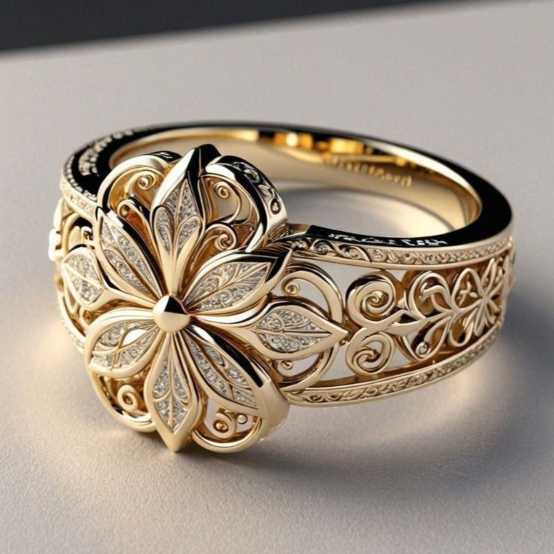 Daniella - Gold ring with exotic floral pattern of zircon
